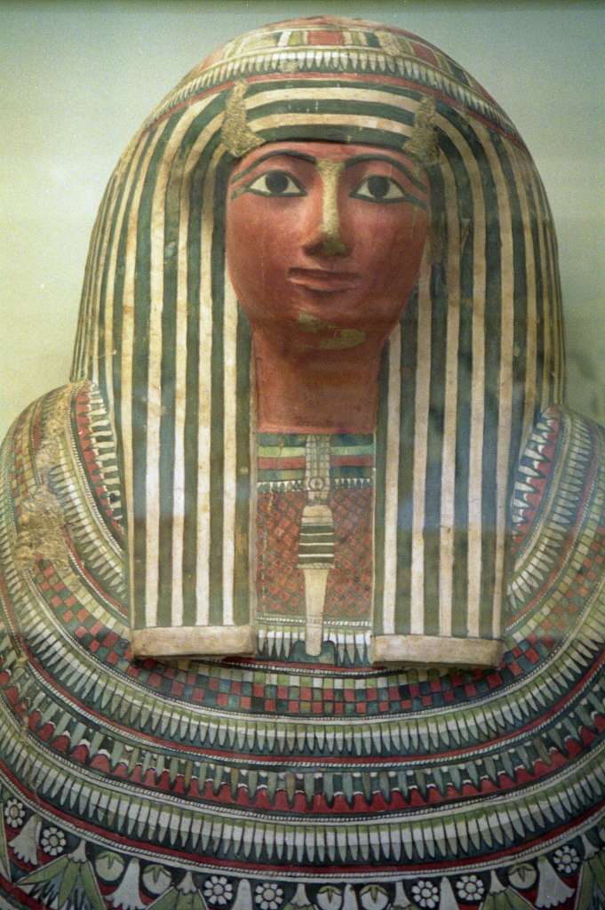 British Museum Top 20 20 Pasenhor Wooden Coffin 20. Wooden coffin of Pasenhor  Thebes Egypt, around 900BC. This coffin is well painted with blue, green, black, red and white colours. Pasenhor wears a striped headdress and an elaborate collar around his shoulders and most of his upper body, with leaf and petal shaped elements, and flowers. The Abydos fetish, symbol of Osiris, is in the centre of the collar.